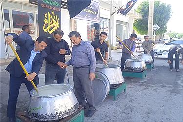 تصویر پخت یک تن و دویست کیلو حلیم نذری در شهر فال